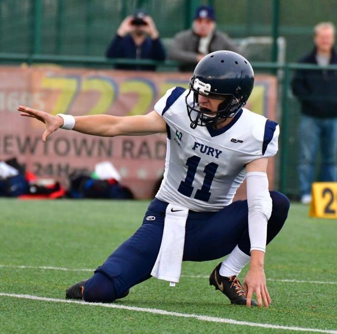 Callum playing American Football